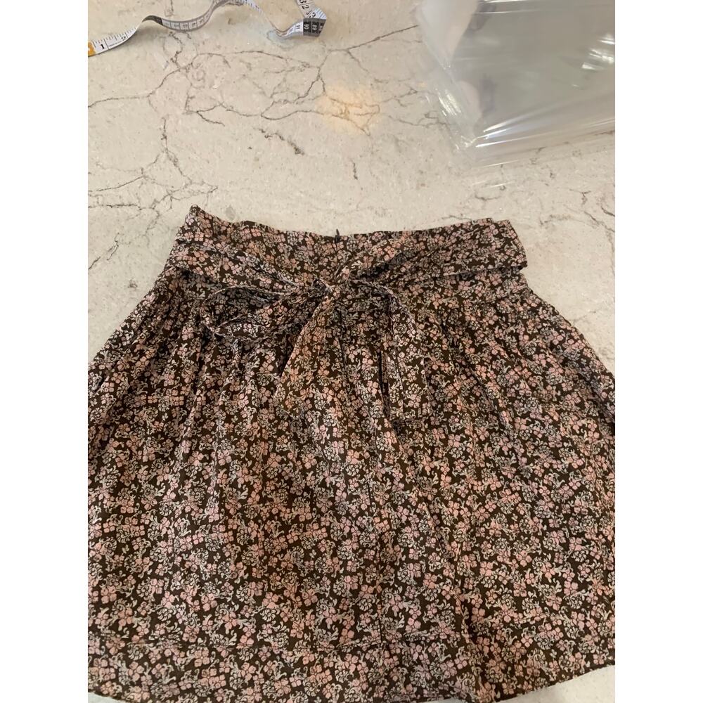 Brown floral mini skirt by Blue Exchange in a women’s size small